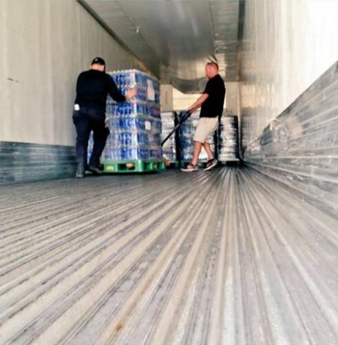 Charlotte Knights Load Wilmington Company’s 18 Wheeler with Water for Matthew Flood Victims